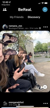 a feed showing an image of people on their phones on BeReal